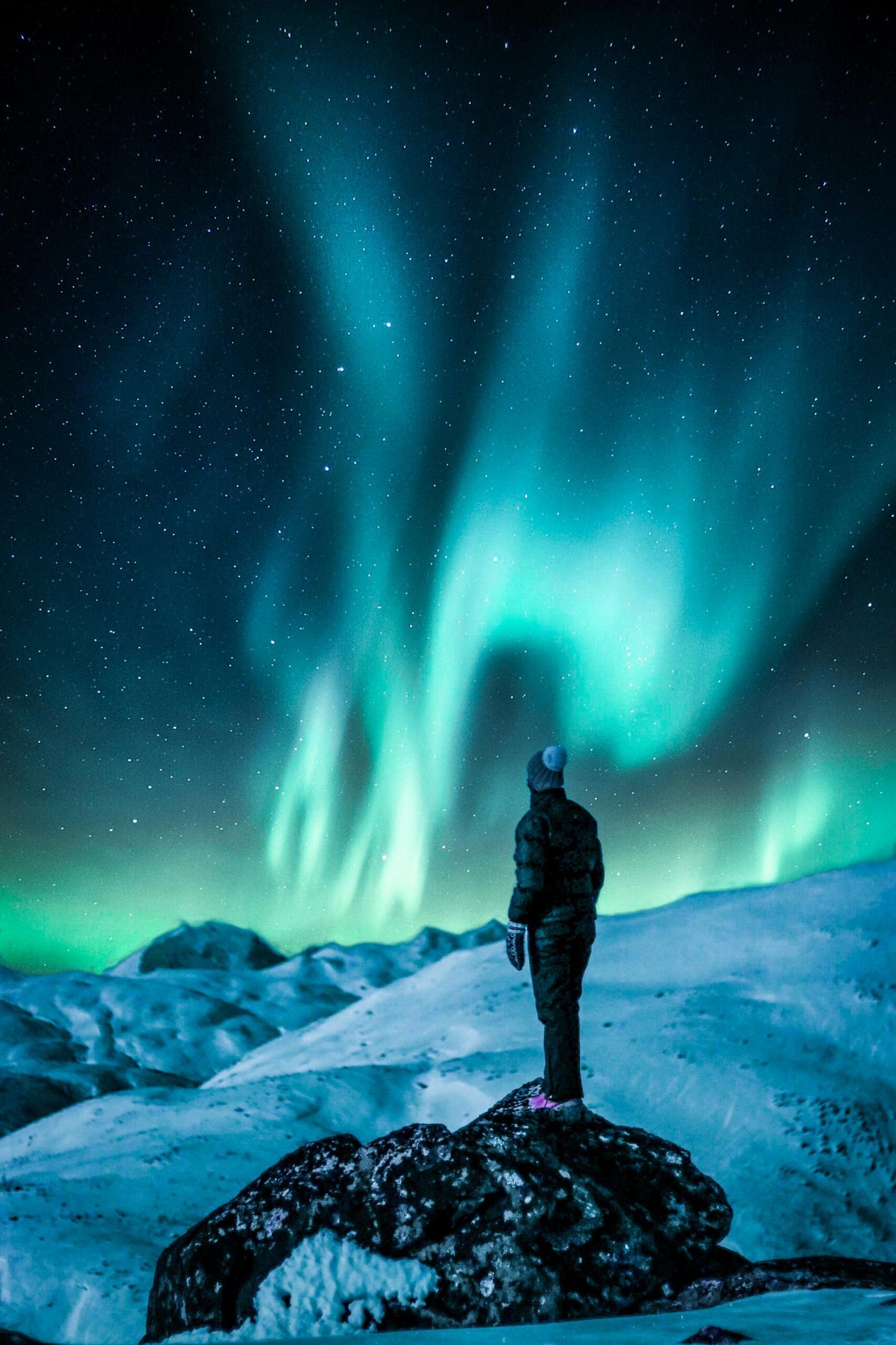 Auroras boreales en el cielo nocturno de Tromsø, Noruega